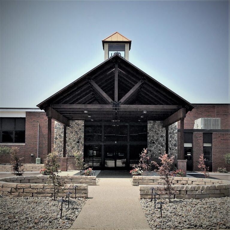 exterior of bells event center, building entrance